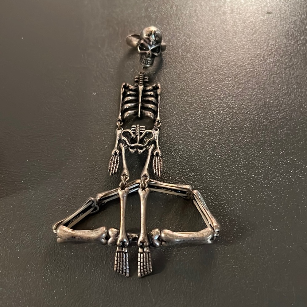 Skull/skeleton ring and bracelet combo.